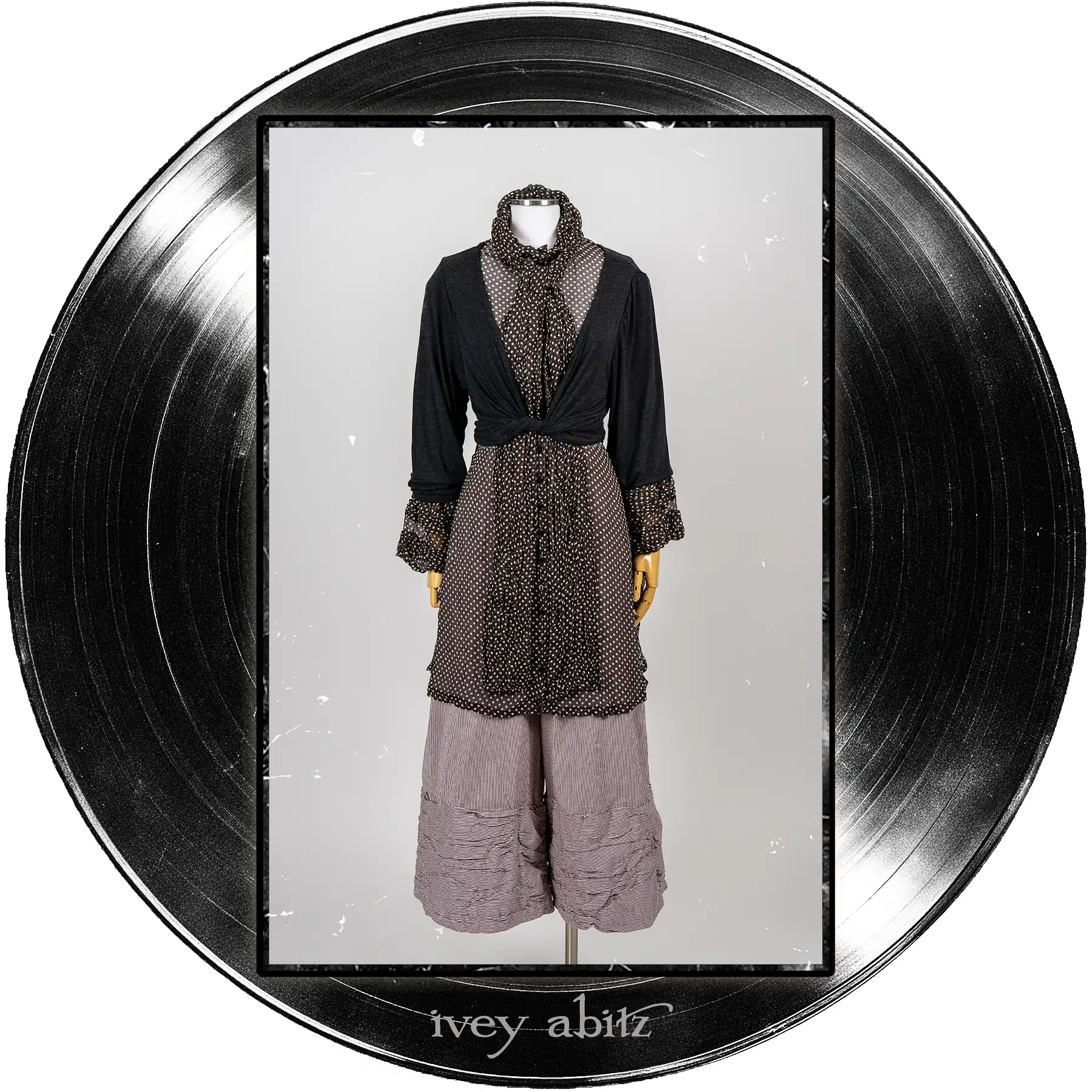 Nan Shirt Jacket in Microphone Dotted Silk Chiffon; Tollie Sash in Microphone Dotted Silk Chiffon; Wright Cardigan in Microphone Soft and Wispy Knit; Fitzgerald Trousers in Center Label and Quarter Note Raised Stripe Weave.
