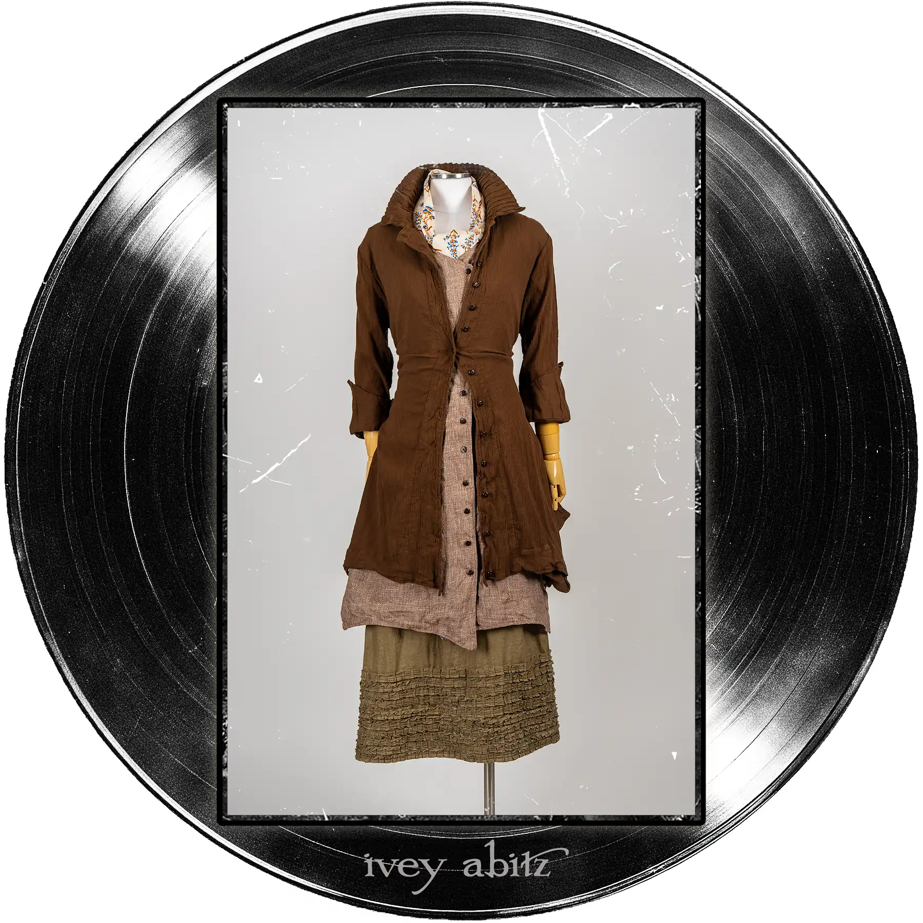 Liberté Shirt Jacket in Record Case Crinkled Weave; Ellis Frock in Record Case Speaker Weave; Cape Frock in Major Chord Washed Linen; Blanchefleur Sash in Far Beyond Forever Floral Weave.