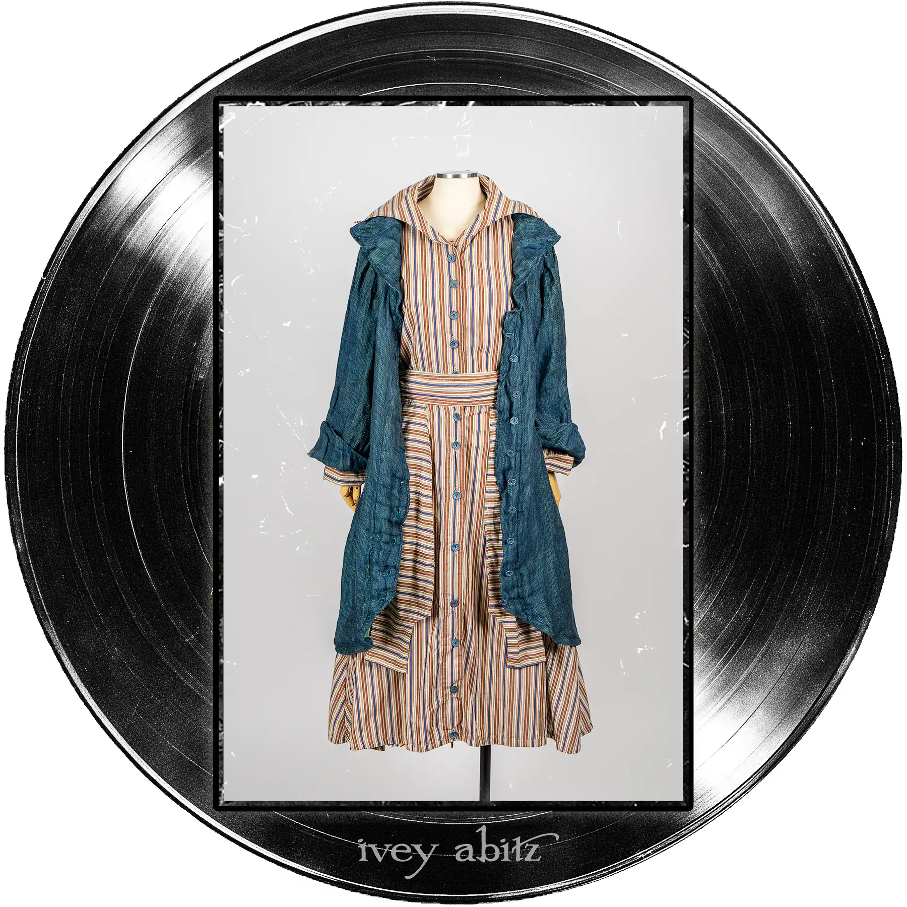 Arthur Hill Duster Coat in Far Beyond Forever Woven Weave; Camborne Dress in Far Beyond Forever Stripe; Camborne Sash in Far Beyond Forever Stripe.