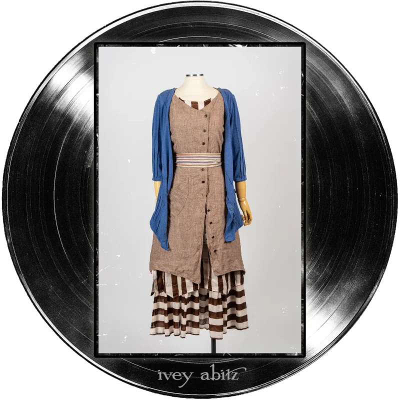 Gweneviere Cardigan in Far Beyond Forever Heathered Knit; Camborne Sash in Far Beyond Forever Stripe; Ellis Frock in Record Case Speaker Weave; Libert&eacute; Frock in Record Case Stripe Voile.
