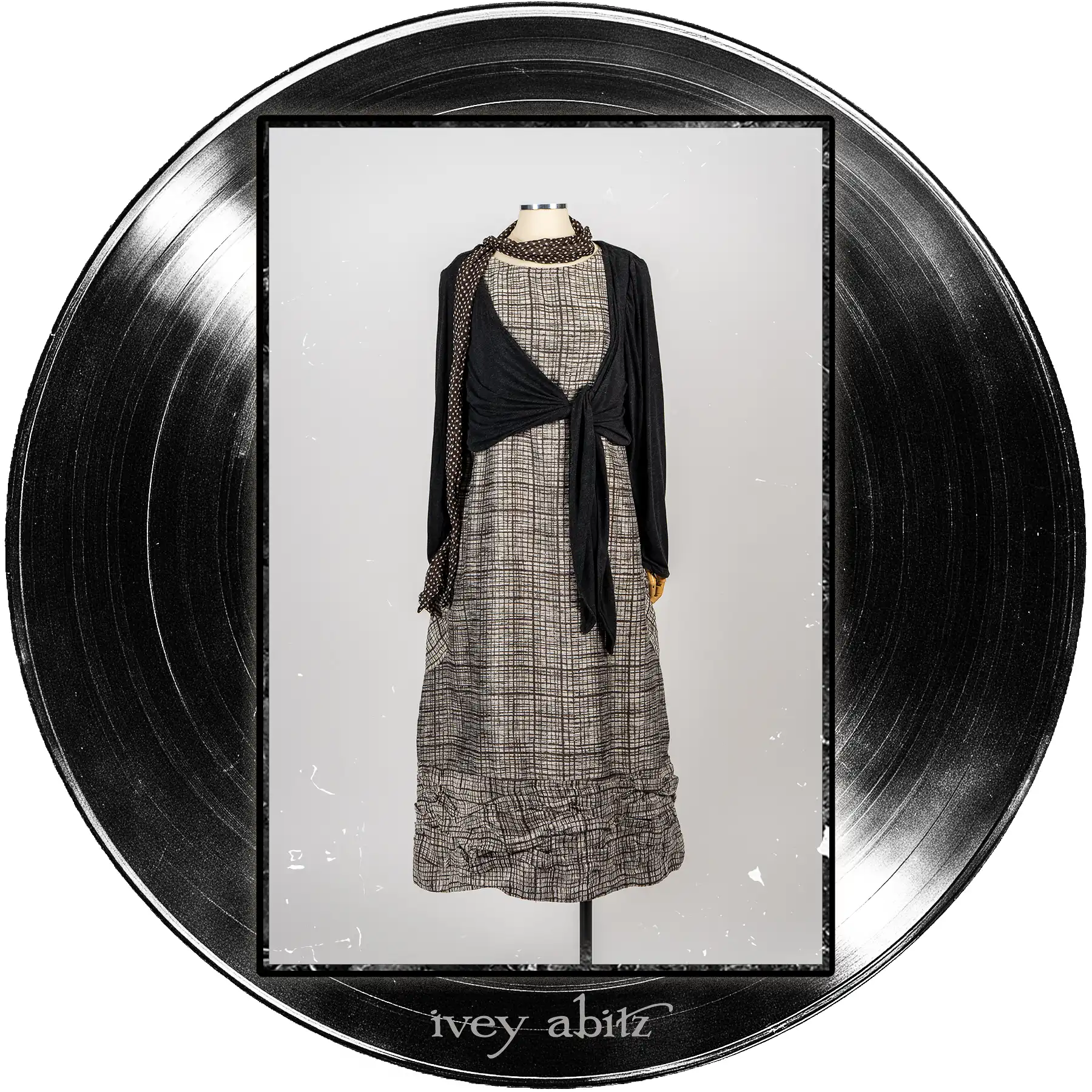 Wright Cardigan in Microphone Soft and Wispy Knit; Fitzgerald Frock in Microphone Striated Weave; Harbourhill Tie in Microphone Dotted Silk Chiffon.