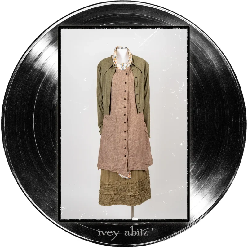 Chittister Cropped Cardigan in Major Chord Heathered Knit; Ellis Frock in Record Case Speaker Weave; Cape Frock in Major Chord Washed Linen; Blanchefleur Sash in Far Beyond Forever Floral Weave.