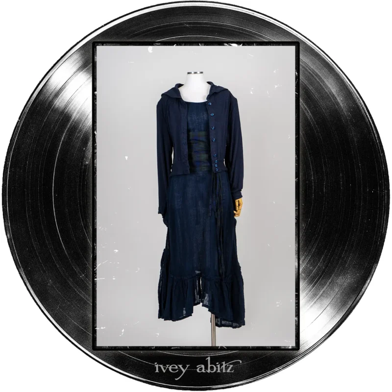 Pippi Cropped Jacket in Blue Note Heathered Knit; Pippi Sash in Blue Note Plaid Voile; Pippi Frock in Blue Note Washed Crinkled Weave.