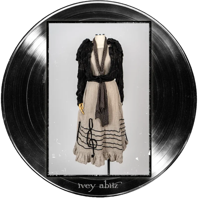 Roycroft Cardigan in Quarter Note and Half Note Puckered Knit; Harbourhill Tie in Microphone Dotted Silk Chiffon; Treble Frock in Half Note Washed Crinkled Weave.