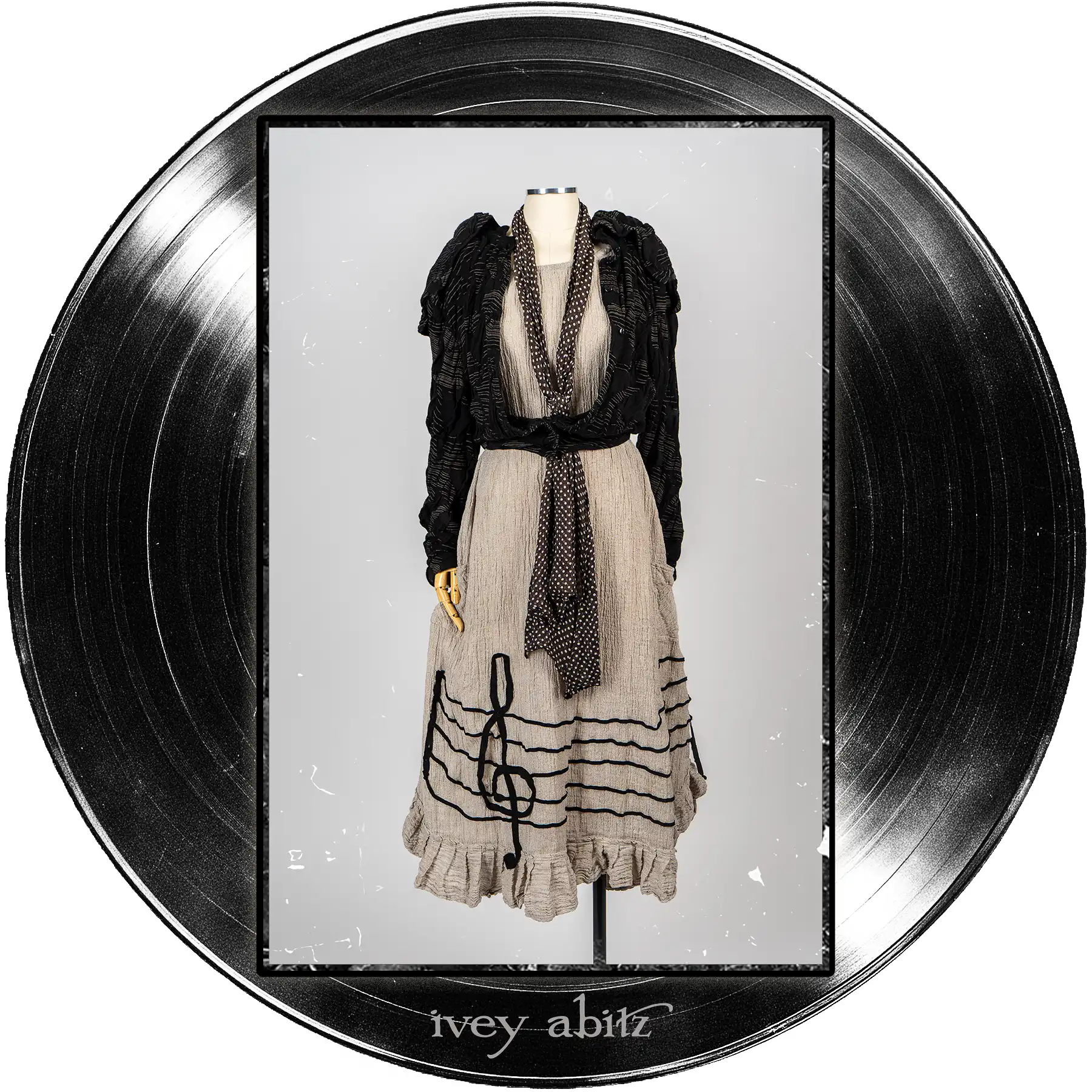 Roycroft Cardigan in Quarter Note and Half Note Puckered Knit; Harbourhill Tie in Microphone Dotted Silk Chiffon; Treble Frock in Half Note Washed Crinkled Weave.