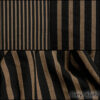 Description: The juxtaposition of the black and sandy hues especially resonate. It is playful without being silly. Smart without being snooty. It is just an everyday delight. Opaque and soft. The natural silk threads in the Riverbank stripe are more rustic and stand out against the black base of the weave. Content: Finely spun cotton and silk. Woven in Itlay. Four season weave. Care: Simply hand wash or put through machine delicate cycle in cold water with a plant based detergent. We suggest using a natural fabric softener to maintain the softness we have washed into it. Tumble dry on extra-low heat for just a few minutes with our artisan wool dryer balls to keep the relaxed effect that is featured in the Look Book.