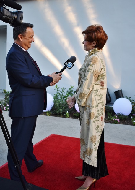 Carolyn Hennesy interviewed in Ivey Abitz bespoke by George Pennacchio of KABC-TV, Los Angeles, at the opening of Master Class.