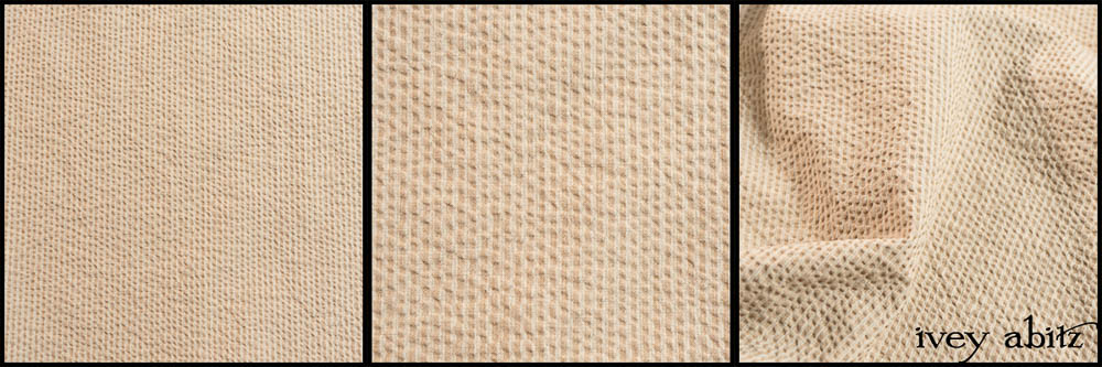 Description: A new take on a seersucker. It is opaque, yet it is sturdy and breezy. A mix of a parchment-like hue and a soft white. Content: 100 percent cotton. Four season weave.Care: Simply hand wash or put through machine delicate cycle in cold water with a plant based detergent. We suggest using a natural fabric softener to maintain the softness we have washed into it. Tumble dry on extra-low heat with our artisan wool dryer balls to keep the relaxed effect that is featured in the Look Book.