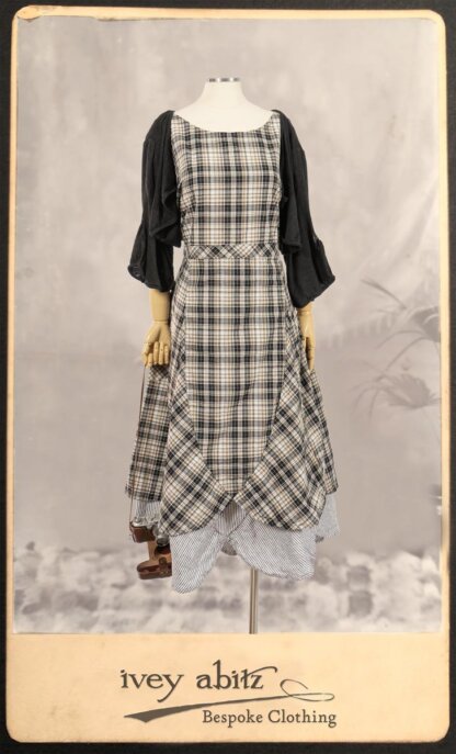 Addy Jacket in Signature Black Lightweight Linen Knit; Addy Frock in Black and White Picture Book Plaid in High Water Length; Addy Skirt in Black and White Petite Stripe Linen. By Ivey Abitz.