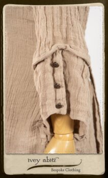 Harrison Shirt Jacket in Picture Book Washed Crinkled Linen; Harrison Frock in Pitcure Book Puckered Stripe Cotton; Blanchefleur Sash in New Day Floral Cotton Voile. By Ivey Abitz.