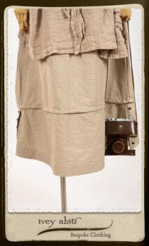 Harrison Shirt Jacket in Picture Book Washed Crinkled Linen; Harrison Frock in Pitcure Book Puckered Stripe Cotton; Blanchefleur Sash in New Day Floral Cotton Voile. By Ivey Abitz.