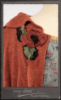 Bertie Jacket in New Sun Softest Knit; Floravinea Brooch in Rosy Washed Crinkled Linen; Tilbrook Frock in Fresh Water Floral Weave; Edenshire Frock in New Sun Washed Linen in High Water Length; Porte Cochere Sash in Rosy Washed Cotton. By Ivey Abitz.