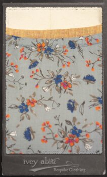 Bertie Jacket in New Sun Softest Knit; Floravinea Brooch in Rosy Washed Crinkled Linen; Tilbrook Frock in Fresh Water Floral Weave; Edenshire Frock in New Sun Washed Linen in High Water Length; Porte Cochere Sash in Rosy Washed Cotton. By Ivey Abitz.