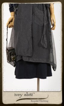 Elliot Dress in Fresh Water Melange Knit; Chevallier Cardigan in Fresh Water Rustic Argyle Knit; Highlands Skirt in Fresh Water Argyle Netting. By Ivey Abitz.