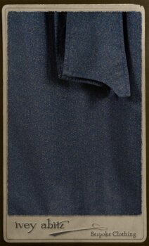 Chevallier Cardigan in Fresh Water Rustic Argyle Knit; Vanetten Frock in Fresh Water Petite Fleur Cotton; Vanetten Sash in Fresh Water Petite Fleur Cotton. By Ivey Abitz.