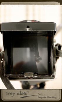 Chevallier Cardigan in Fresh Water Rustic Argyle Knit; Vanetten Frock in Fresh Water Petite Fleur Cotton; Vanetten Sash in Fresh Water Petite Fleur Cotton. By Ivey Abitz.