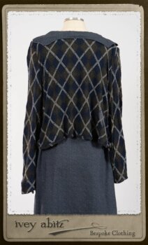 Chevallier Cardigan in Fresh Water Rustic Argyle Knit; Vanetten Frock in Fresh Water Petite Fleur Cotton; Vanetten Sash in Fresh Water Petite Fleur Cotton. By Ivey Abitz.