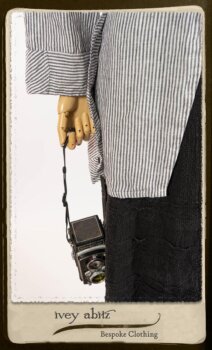 Campanella Shirt Jacket in Black and White Petite Stripe Linen; Bertie Frock in Black Puckered Check Weave; Cilla Slip Frock in Signature Black Lightweight Linen Knit; Floravinea Brooch in Rosy Washed Crinkled Linen. By Ivey Abitz.