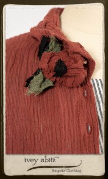 Scattergood Duster Coat in Rosy Washed Crinkled Linen; Scattergood Frock in Black and White Petite Stripe Linen; Floravinea Brooch in Rosy Washed Crinkled Linen. By Ivey Abitz.