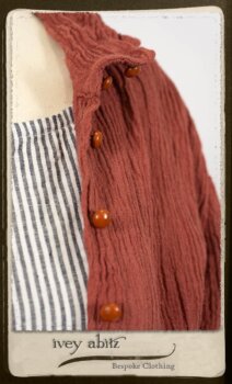 Scattergood Duster Coat in Rosy Washed Crinkled Linen; Scattergood Frock in Black and White Petite Stripe Linen; Floravinea Brooch in Rosy Washed Crinkled Linen. By Ivey Abitz.