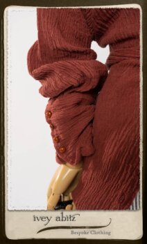 Scattergood Duster Coat in Rosy Washed Crinkled Linen; Scattergood Frock in Black and White Petite Stripe Linen; Floravinea Brooch in Rosy Washed Crinkled Linen. By Ivey Abitz.