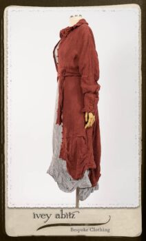 Scattergood Duster Coat in Rosy Washed Crinkled Linen; Scattergood Frock in Black and White Petite Stripe Linen; Floravinea Brooch in Rosy Washed Crinkled Linen. By Ivey Abitz.