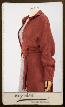 Scattergood Duster Coat in Rosy Washed Crinkled Linen; Scattergood Frock in Black and White Petite Stripe Linen; Floravinea Brooch in Rosy Washed Crinkled Linen. By Ivey Abitz.