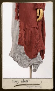 Scattergood Duster Coat in Rosy Washed Crinkled Linen; Scattergood Frock in Black and White Petite Stripe Linen; Floravinea Brooch in Rosy Washed Crinkled Linen. By Ivey Abitz.