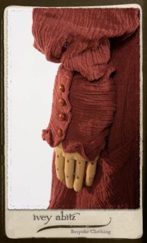 Scattergood Duster Coat in Rosy Washed Crinkled Linen; Scattergood Frock in Black and White Petite Stripe Linen; Floravinea Brooch in Rosy Washed Crinkled Linen. By Ivey Abitz.