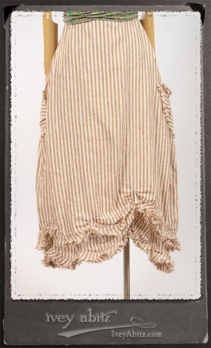Au Sable Frock in Camera Case Washed Stripe Linen in High Water Length; Au Sable Skirt in Camera Case Washed Stripe Linen; Blanchefleur Sash in New Day Floral Cotton Voile. By Ivey Abitz.
