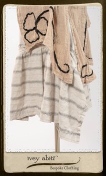 Monceau Duster Coat in Picture Book Washed Crinkled Linen; Fairholme Frock in Black and White Picture Book Stripe in High Water Length. By Ivey Abitz.