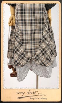 Addy Jacket in Signature Black Lightweight Linen Knit; Addy Frock in Black and White Picture Book Plaid in High Water Length; Addy Skirt in Black and White Petite Stripe Linen. By Ivey Abitz.