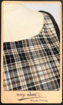 Addy Jacket in Signature Black Lightweight Linen Knit; Addy Frock in Black and White Picture Book Plaid in High Water Length; Addy Skirt in Black and White Petite Stripe Linen. By Ivey Abitz.