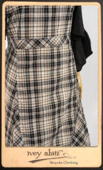 Addy Jacket in Signature Black Lightweight Linen Knit; Addy Frock in Black and White Picture Book Plaid in High Water Length; Addy Skirt in Black and White Petite Stripe Linen. By Ivey Abitz.