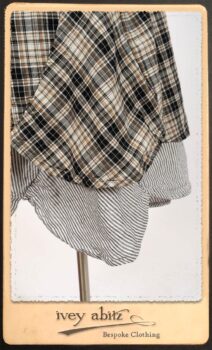 Addy Jacket in Signature Black Lightweight Linen Knit; Addy Frock in Black and White Picture Book Plaid in High Water Length; Addy Skirt in Black and White Petite Stripe Linen. By Ivey Abitz.