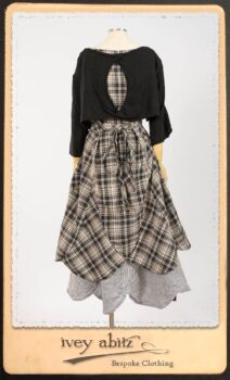 Addy Jacket in Signature Black Lightweight Linen Knit; Addy Frock in Black and White Picture Book Plaid in High Water Length; Addy Skirt in Black and White Petite Stripe Linen. By Ivey Abitz.