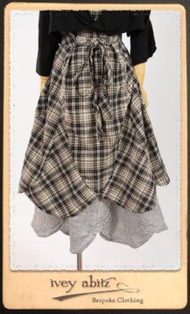 Addy Jacket in Signature Black Lightweight Linen Knit; Addy Frock in Black and White Picture Book Plaid in High Water Length; Addy Skirt in Black and White Petite Stripe Linen. By Ivey Abitz.