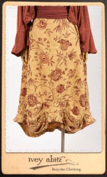 Crest Jacket in New Sun Softest Knit; Clotaire Sash in Rosy Washed Crinkled Linen; Scattergood Frock in Rosy Washed Floral Linen. By Ivey Abitz.