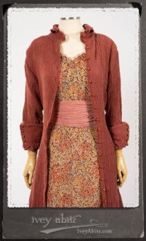 Scattergood Duster Coat in Rosy Washed Crinkled Linen; Crest Frock in New Sun Floral Silk Chiffon in High Water Length; Heraldry Frock in Rosy Washed Stripe Linen in High Water Length; Porte Cochere Sash in Rosy Washed Cotton. By Ivey Abitz.