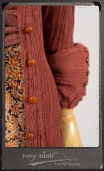 Scattergood Duster Coat in Rosy Washed Crinkled Linen; Crest Frock in New Sun Floral Silk Chiffon in High Water Length; Heraldry Frock in Rosy Washed Stripe Linen in High Water Length; Porte Cochere Sash in Rosy Washed Cotton. By Ivey Abitz.