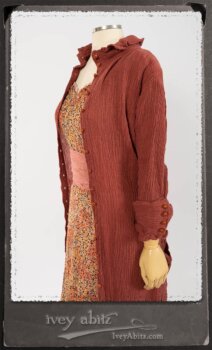 Scattergood Duster Coat in Rosy Washed Crinkled Linen; Crest Frock in New Sun Floral Silk Chiffon in High Water Length; Heraldry Frock in Rosy Washed Stripe Linen in High Water Length; Porte Cochere Sash in Rosy Washed Cotton. By Ivey Abitz.