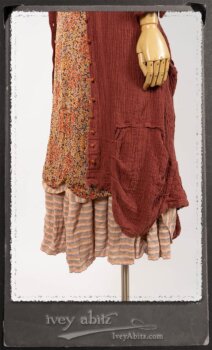 Scattergood Duster Coat in Rosy Washed Crinkled Linen; Crest Frock in New Sun Floral Silk Chiffon in High Water Length; Heraldry Frock in Rosy Washed Stripe Linen in High Water Length; Porte Cochere Sash in Rosy Washed Cotton. By Ivey Abitz.