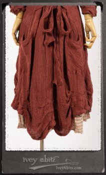 Scattergood Duster Coat in Rosy Washed Crinkled Linen; Crest Frock in New Sun Floral Silk Chiffon in High Water Length; Heraldry Frock in Rosy Washed Stripe Linen in High Water Length; Porte Cochere Sash in Rosy Washed Cotton. By Ivey Abitz.