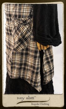 Bramley Frock in Black and White Picture Book Plaid; Clotaire Sash in White on Black Floral Silk Chiffon; Bertie Jacket in Black Floral Raised Knit; Bertie Frock in Black Puckered Check Weave. By Ivey Abitz.