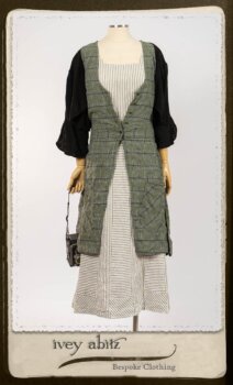 Campanella Overlay in New Day Washed Plaid Gauze; Addy Jacket in Signature Black Lightweight Linen Knit; Campanella Frock in New Day Washed Stripe Linen. By Ivey Abitz.