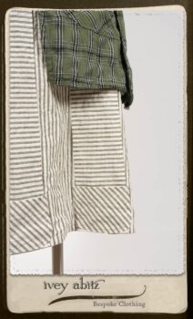 Campanella Overlay in New Day Washed Plaid Gauze; Addy Jacket in Signature Black Lightweight Linen Knit; Campanella Frock in New Day Washed Stripe Linen. By Ivey Abitz.