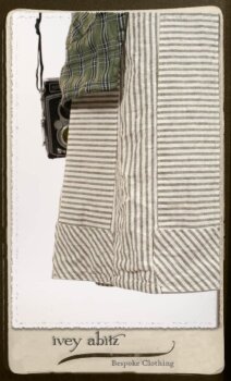 Campanella Overlay in New Day Washed Plaid Gauze; Addy Jacket in Signature Black Lightweight Linen Knit; Campanella Frock in New Day Washed Stripe Linen. By Ivey Abitz.