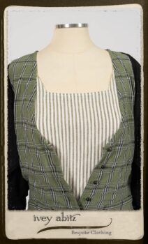 Campanella Overlay in New Day Washed Plaid Gauze; Addy Jacket in Signature Black Lightweight Linen Knit; Campanella Frock in New Day Washed Stripe Linen. By Ivey Abitz.