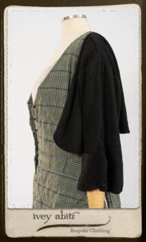 Campanella Overlay in New Day Washed Plaid Gauze; Addy Jacket in Signature Black Lightweight Linen Knit; Campanella Frock in New Day Washed Stripe Linen. By Ivey Abitz.
