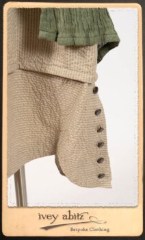 Campanella Duster Coat in New Day Washed Crinkled Linen; Harrison Frock in Picture Book Puckered Stripe Cotton; Blanchefleur Sash in New Day Floral Cotton Voile. By Ivey Abitz.